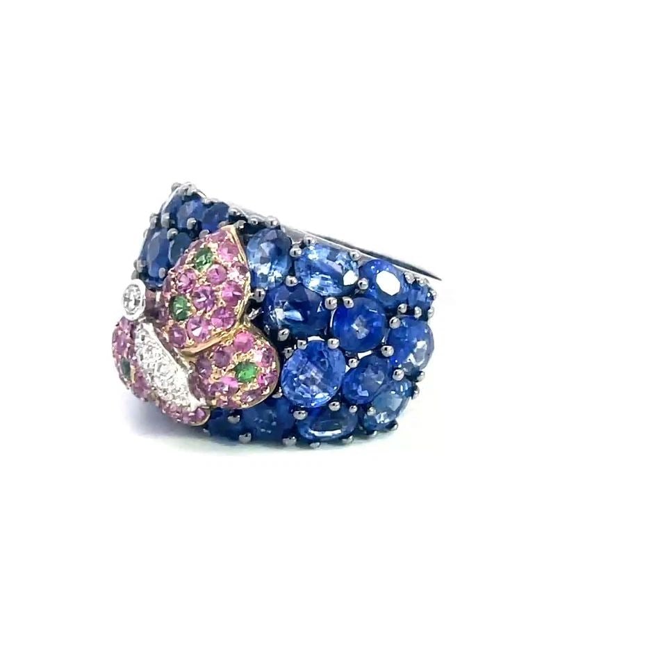 DIAMOND SAPPHIRES & GEMS GOLD RING 18K WHITE BUTTERFLY DOME STYLE BAND SIZE 7: Elevate your jewelry collection with the exquisite diamond & Gems Gold Ring, crafted in 18k white gold for a timeless sparkle. The front half is wide and has sapphire gemstones with an adorable butter