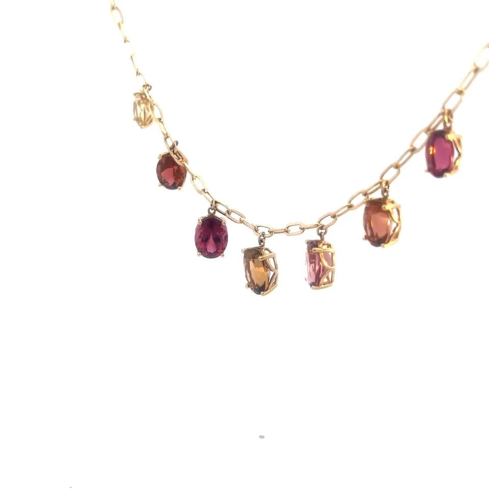 GOLD GEMSTONE NECKLACE 14K YELLOW OVAL GEMESTONES CHAIN DANGLE CHARMS: GOLD GEMSTONE NECKLACE 14K YELLOW OVAL GEMESTONES CHAIN DANGLE CHARMS The gemstone necklace is a lovely piece of fine jewelry featuring an oval shape colored stones in a vibrant pink yellow and orange