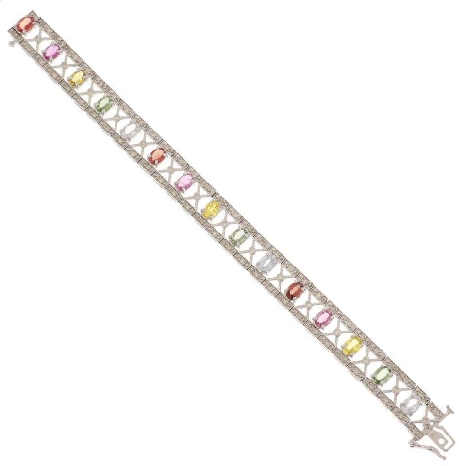 SAPPHIRE DIAMOND BRACELET 14K WHITE GOLD MULTICOLOR SAPPHIRES.: Wide 8.8ct Multicolor Sapphire Diamond 14k White Gold Bracelet Description A chic and beautiful open design wide bracelet, crafted from 14k white gold featuring X hourglass shape links set with diamon