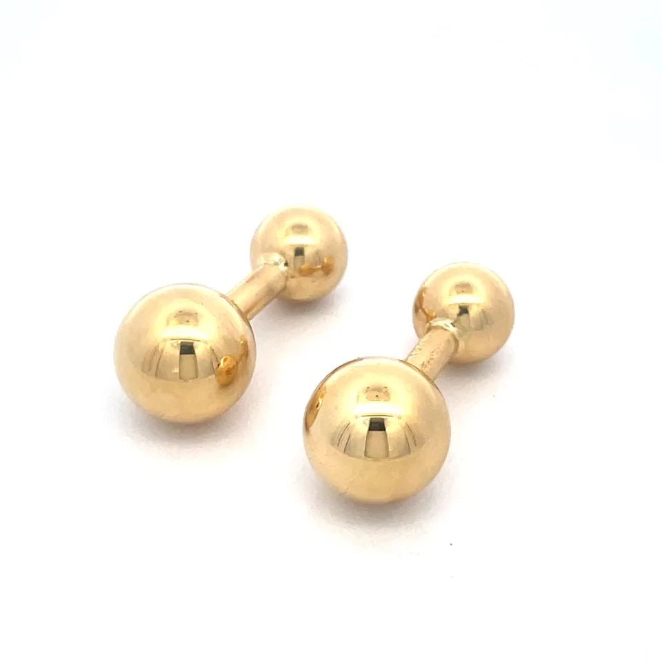 CARTIER GOLD BARBELL CUFFLINKS 18K YELLOW BALL RETURN STYLE: CARTIER GOLD BARBELL CUFFLINKS 18K YELLOW BALL RETURN STYLE These vintage Cartier barbell cufflinks are a luxurious accessory for men, crafted from 18k yellow gold with high polished return balls 10mm