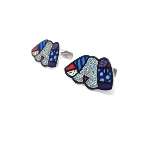 BRITTO X OC GOLD DOG HEAD CUFFLINKS 18K WHITE ENAMEL & GEMS: BRITTO X OC GOLD DOG HEAD CUFFLINKS 18K WHITE ENAMEL & GEMS This is an authentic charming pair of cufflinks by Romero Britto, it is crafted from 18k solid white gold featuring an adorable Basset Hound