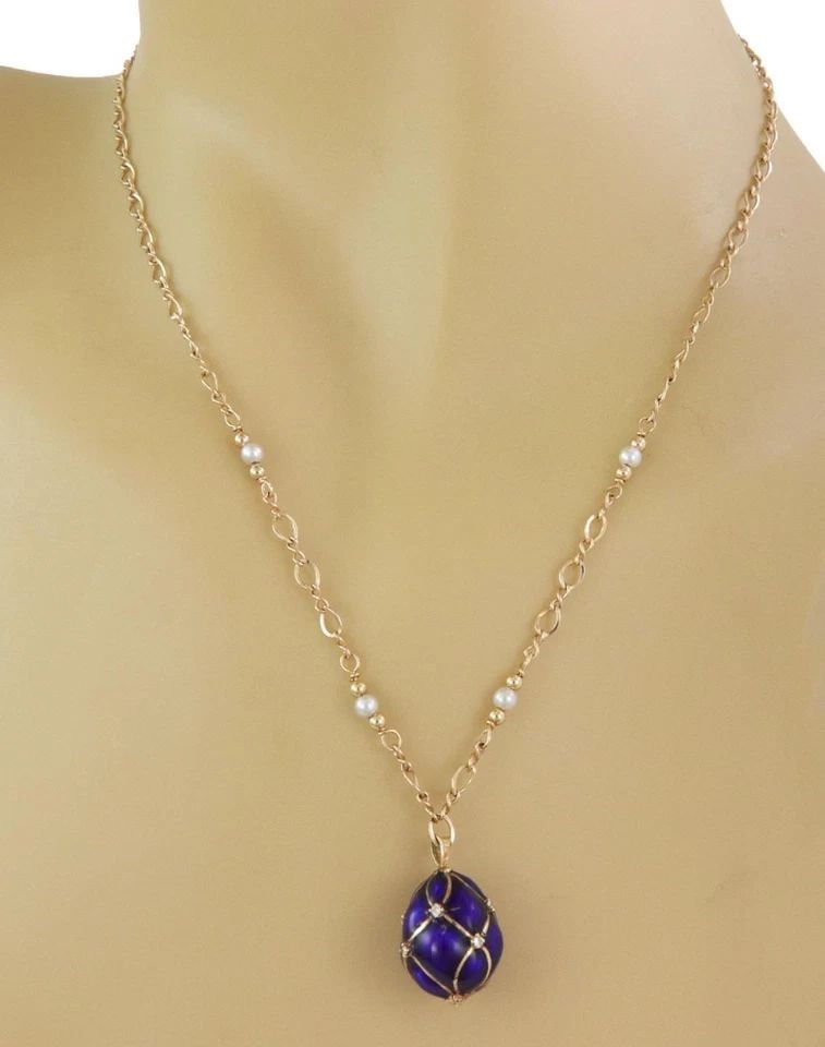 DIAMOND PEARLS ENAMEL EGG 14K YELLOW GOLD FANCY PENDANT & CHAIN: DIAMOND PEARLS ENAMEL EGG 14K YELLOW GOLD FANCY PENDANT & CHAIN Estate Diamond Pearls Enamel 14k Yellow Gold Fancy Egg Pendant & Chain Description This lovely pendant and chain is crafted from 14k yel