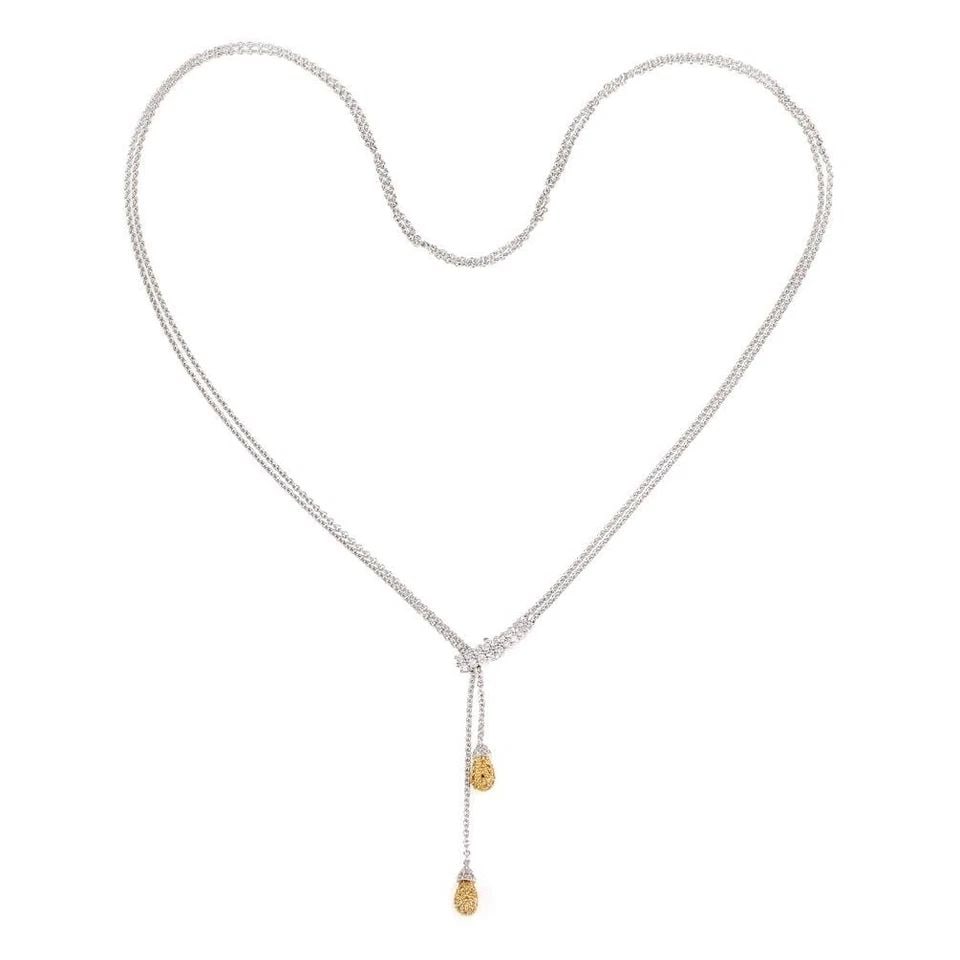 18K GOLD LARIAT YELLOW DIAMONDS PENDANT CHAIN: 18K GOLD LARIAT YELLOW DIAMONDS PENDANT CHAIN 18k Gold White Fancy Yellow Diamond Pendant Lariat Chain Description This is a lovely modern contemporary style lariat necklace, it is crafted from 18k ye