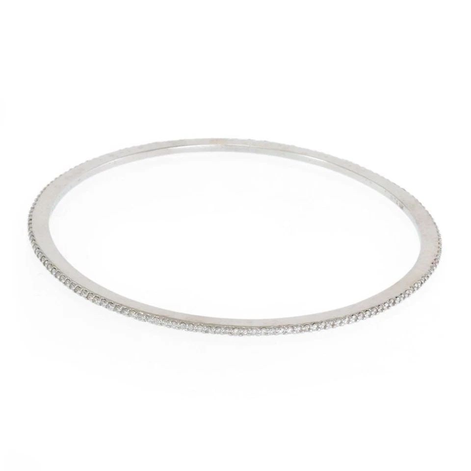 ELEGANT 1.5CT MICROPAVE SET DIAMOND 14K WHITE GOLD SLIM BANGLE LIQUIDATION!: ELEGANT 1.5CT MICROPAVE SET DIAMOND 14K WHITE GOLD SLIM BANGLE ! Elegant 1.5ct Micropave Set Diamond 14k White Gold Slim Bangle ! Description This elegant bangle is crafted from 14k white gold, it is 