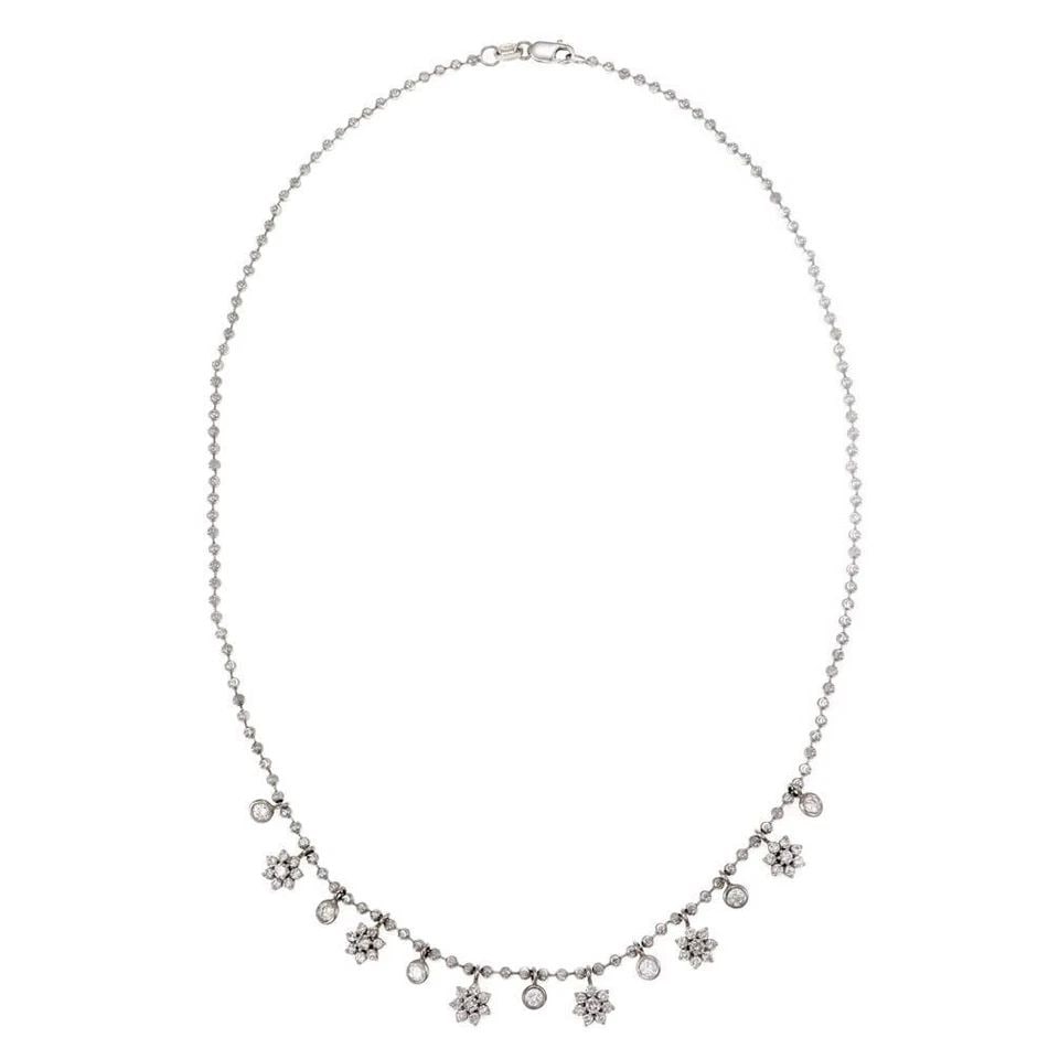 LOVELY 1.00CT DIAMOND 14K WHITE GOLD FLORAL CHARMS BEAD NECKLACE LIQUIDATION: LOVELY 1.00CT DIAMOND 14K WHITE GOLD FLORAL CHARMS BEAD NECKLACE Lovely 1.00ct Diamond 14k White gold Floral Charms Bead Necklace Description This beautiful necklace is crafted from 14k white gold, th
