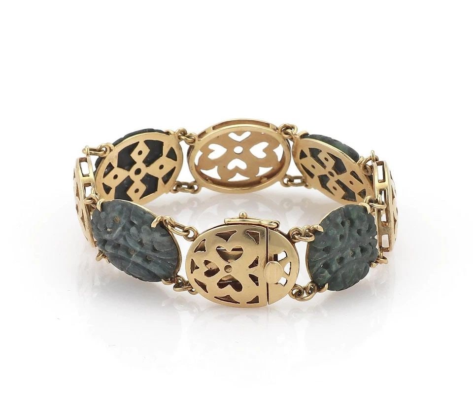 14K YELLOW GOLD HAND-CARVED JADE FLORAL LINK BRACELET: 14K YELLOW GOLD HAND-CARVED JADE FLORAL LINK BRACELET 14k Yellow Gold Hand-Carved Jade Floral Link Bracelet Description This is a beautiful Retro Era bracelet, it is crafted from 14k yellow gold, it f