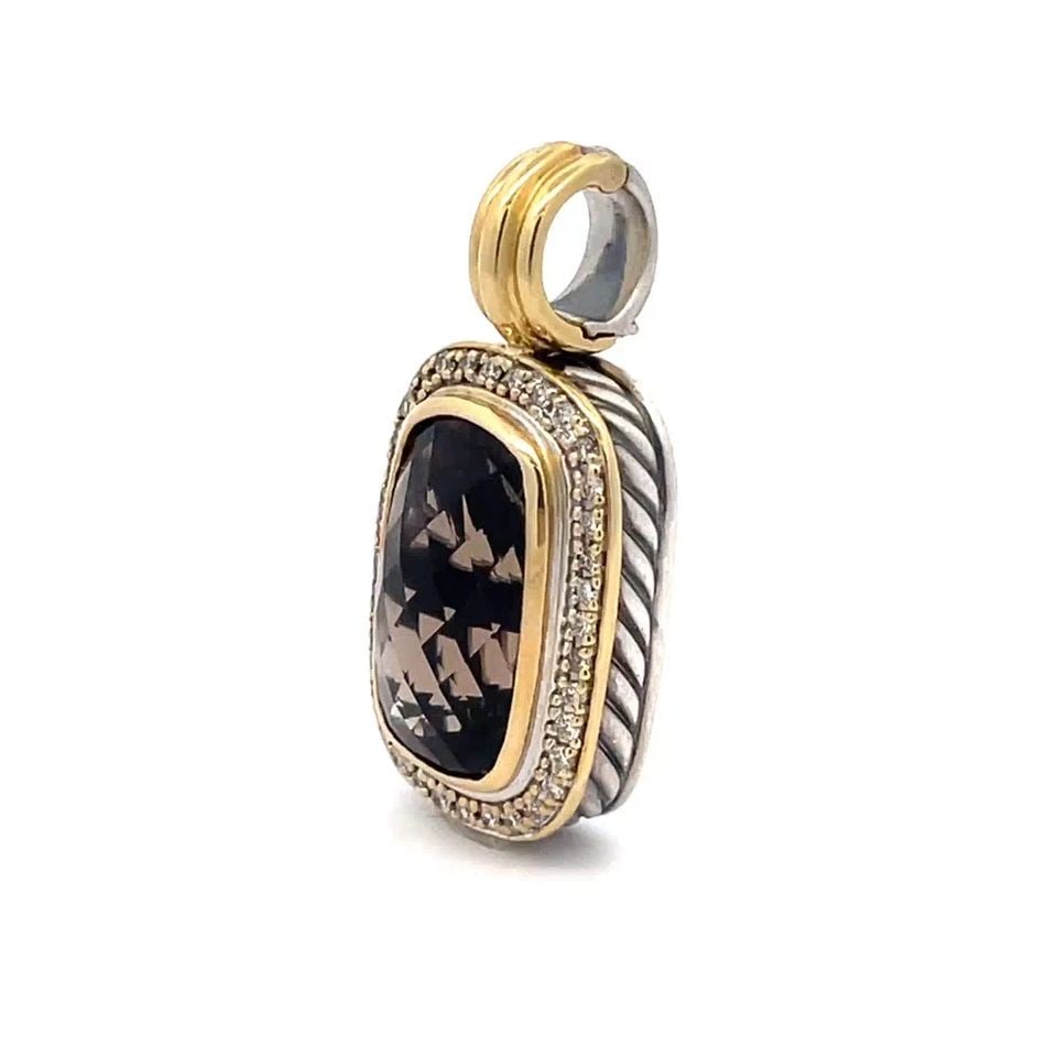 DESIGNER DIAMOND SMOKY QUARTZ STERLING SILVER 18K YELLOW GOLD LONG PENDANT: DESIGNER DIAMOND SMOKY QUARTZ STERLING SILVER 18K YELLOW GOLD LONG PENDANT This pendant is crafted from sterling silver with 18k yellow gold accent, it is signed D.Y. The top center has a long oval sh