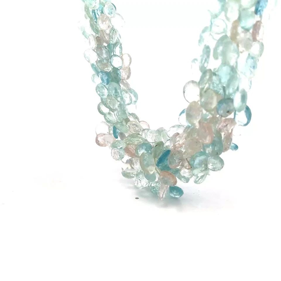 AQUAMARINE GOLD TORSADE NECKLACE 18K WHITE 5 BRIOLETTE BEADS: AQUAMARINE GOLD TORSADE NECKLACE 18K WHITE 5 BRIOLETTE BEADS This is a gorgeous torsade necklace, it features 5 cluster strands with briolette cut aquamarine gemstones in light and medium blue colors.