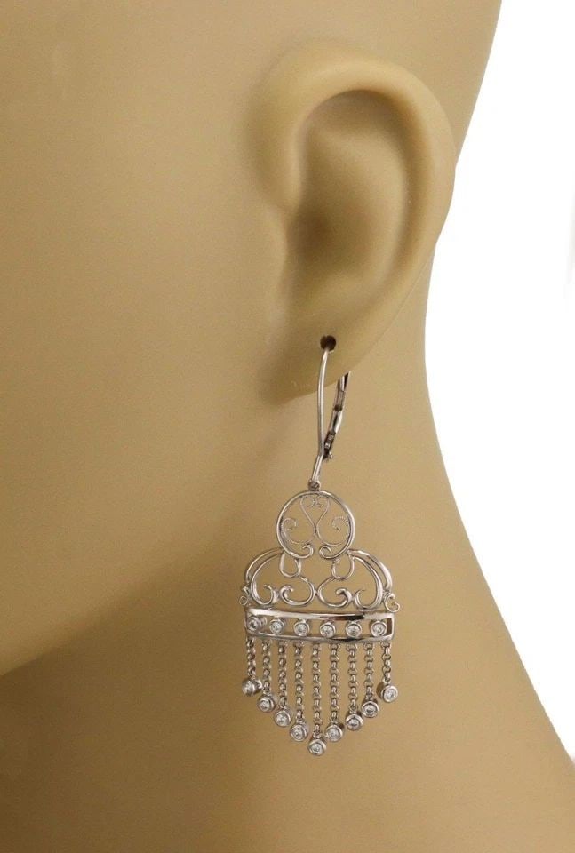 ESTATE DIAMOND 14K WHITE GOLD FANCY CHANDELIER EARRINGS: ESTATE DIAMOND 14K WHITE GOLD FANCY CHANDELIER EARRINGS Estate Diamond 14k White Gold Fancy Chandelier Earrings Description This is a beautiful pair of Estate earrings, they are crafted from 14k white