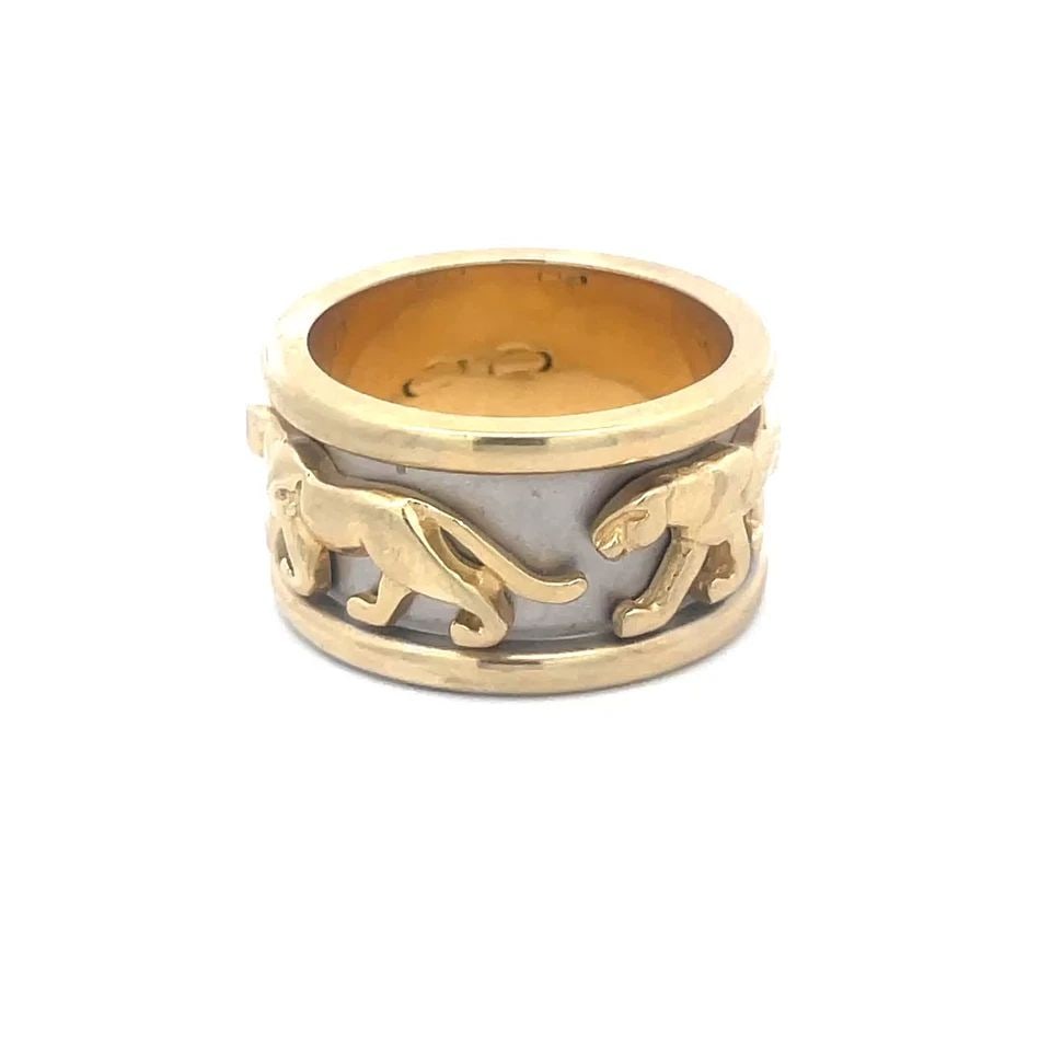 GOLD PANTHER WIDE BAND 14K TWO TONE HIGH RELIEF SCULPTED STYLE RING SIZE 9: This lovely panther theme wide band ring is a vintage piece crafted in 14k yellow and white gold with high relief full figure polished yellow gold sculpted panthers in a walking position set around th