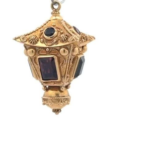 18K LANTERN FOB PENDANT YELLOW GOLD MULTICOLOR GEMS VINTAGE: 18K LANTERN FOB PENDANT YELLOW GOLD MULTICOLOR GEMS VINTAGE This is a vintage fob pendant, it has between 18kt gold featuring a lovely lantern shape with Etruscan floral design accented with emerald c