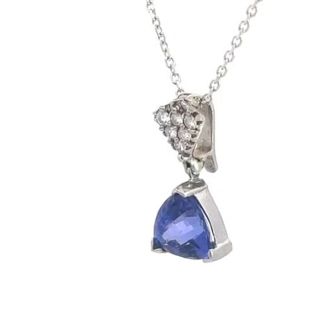 TANZANITE DIAMOND GOLD PENDANT DIAMOND 14K GOLD NECKLACE: TANZANITE DIAMOND GOLD PENDANT DIAMOND 14K GOLD NECKLACE This is a lovely pendant and chain necklace. The trillion-cut tanzanite is mounted in white gold and the trillion 14k white gold shape bail is 