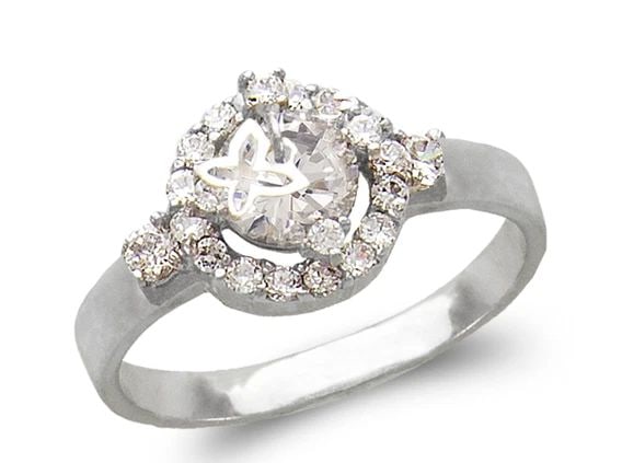 NEW 14K WHITE GOLD LADIES FANCY WHITE SOLITAIRE BUTTERFLY RING: NEW 14K WHITE GOLD LADIES FANCY WHITE SOLITAIRE BUTTERFLY RING LADIES FANCY WHITE SOLITAIRE BUTTERFLY RING NEW 14K WHITE GOLD Apx. WIDTH: 10mm Apx. WEIGHT: 4.1g