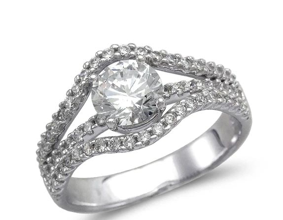 NEW 14K WHITE GOLD LADIES FANCY WHITE SOLITAIRE RING: NEW 14K WHITE GOLD LADIES FANCY WHITE SOLITAIRE RING LADIES FANCY WHITE SOLITAIRE RING NEW 14K WHITE GOLD Apx. WIDTH: 10mm Apx. WEIGHT: 4.0g