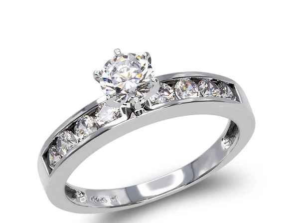 NEW 14K WHITE GOLD LADIES FANCY WHITE SOLITAIRE RING: NEW 14K WHITE GOLD LADIES FANCY WHITE SOLITAIRE RING LADIES FANCY WHITE SOLITAIRE RING NEW 14K WHITE GOLD Apx. WIDTH: 4mm Apx. WEIGHT: 3.3g