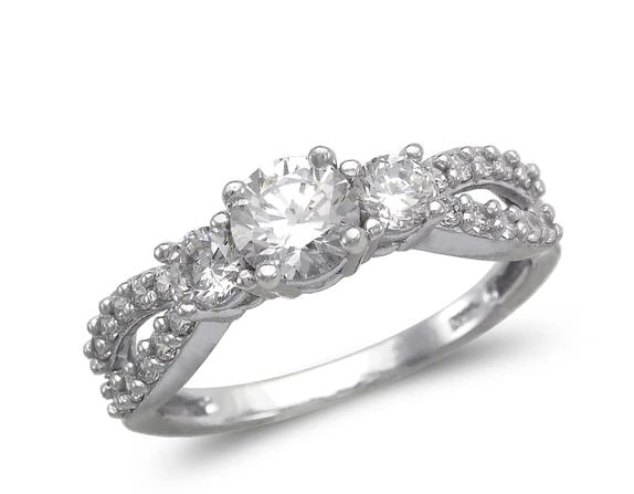 NEW 14K WHITE GOLD LADIES FANCY WHITE SOLITAIRE RING: NEW 14K WHITE GOLD LADIES FANCY WHITE SOLITAIRE RING LADIES FANCY WHITE SOLITAIRE RING NEW 14K WHITE GOLD Apx. WIDTH: 5mm Apx. WEIGHT: 3.1g