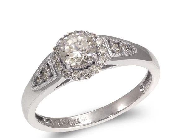 NEW 14K WHITE GOLD LADIES FANCY WHITE SOLITAIRE HALO RING: NEW 14K WHITE GOLD LADIES FANCY WHITE SOLITAIRE HALO RING LADIES FANCY WHITE SOLITAIRE HALO RING NEW 14K WHITE GOLD Apx. WIDTH: 5mm Apx. WEIGHT: 2.7g
