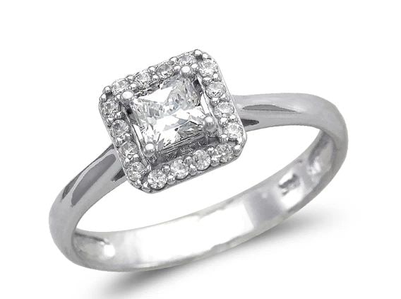 NEW 14K WHITE GOLD LADIES FANCY WHITE HALO PRINCESS CUT SOLITAIRE RING: NEW 14K WHITE GOLD LADIES FANCY WHITE HALO PRINCESS CUT SOLITAIRE RING LADIES FANCY WHITE HALO PRINCESS CUT SOLITAIRE RING NEW 14K WHITE GOLD Apx. WIDTH: 8mm Apx. WEIGHT: 2.6g