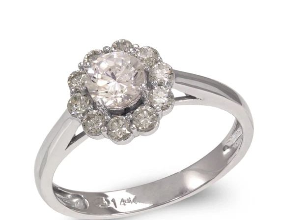 NEW 14K WHITE GOLD LADIES FANCY WHITE SOLITAIRE FLOWER HALO RING: NEW 14K WHITE GOLD LADIES FANCY WHITE SOLITAIRE FLOWER HALO RING LADIES FANCY WHITE SOLITAIRE FLOWER HALO RING NEW 14K WHITE GOLD Apx. WIDTH: 5mm Apx. WEIGHT: 2.6g