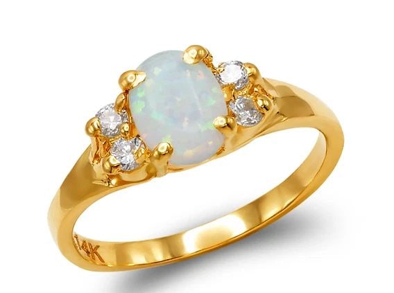 NEW 14K TWO TONE GOLD LADIES OPAL RING: NEW 14K TWO TONE GOLD LADIES OPAL RINGLADIES OPAL RINGNEW 14KTWO TONE GOLDApx. WIDTH: 6mmApx. WEIGHT: 2.5g