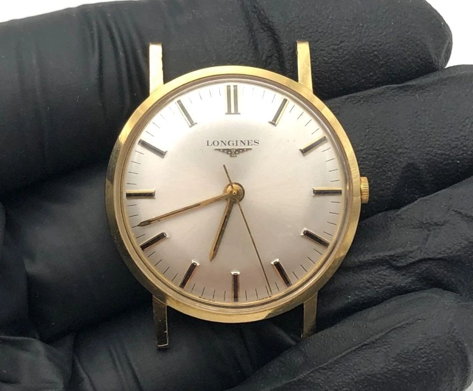 VINTAGE LONGINES 18K YELLOW GOLD 34MM CASE, 284 MOVEMENT, 17 JEWELS HAND WINDING: VINTAGE LONGINES 18K YELLOW GOLD 34MM CASE, 284 MOVEMENT, 17 JEWELS HAND WINDING Vintage Longines 18k Yellow Gold, 284 movement, 17 Jewels Hand Winding 34mm You are bidding on a Vintage Longines 18k Y