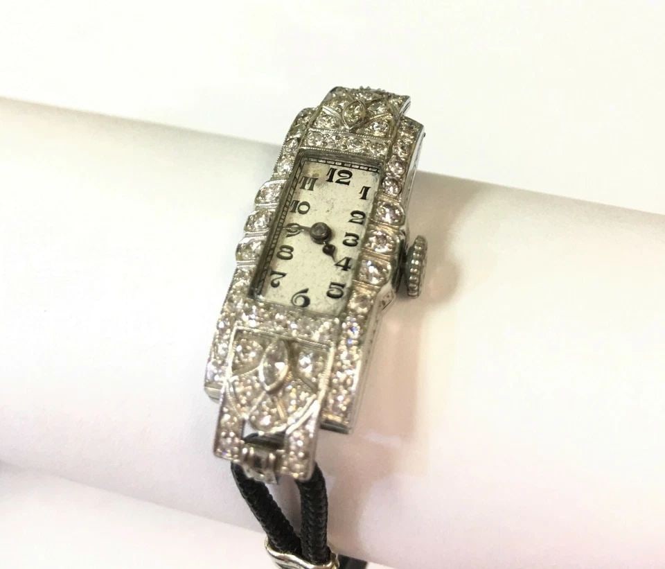 VINTAGE WOMAN'S PLATINUM WATCH WITH DIAMONDS AND 18K CLASP 17 JEWELS: VINTAGE WOMAN'S PLATINUM WATCH WITH DIAMONDS AND 18K CLASP 17 JEWELS Vintage Woman's Platinum Watch with Diamonds and 18k Clasp 17 Jewels You are bidding on a Vintage Woman's Platinum Watch with Diamo