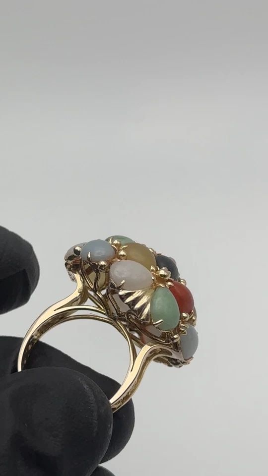 14K GOLD RING SET WITH MULTIPLE COLORED JADE STONES ( SIZE: 8.5 ) 11.5 GRAMS: 14K GOLD RING SET WITH MULTIPLE COLORED JADE STONES SIZE: 8.5 14k Gold Ring, Mushroom Shaped, set with multiple colored Jade Stones Condition: Used, has been cleaned by our in house Jewelers Material: