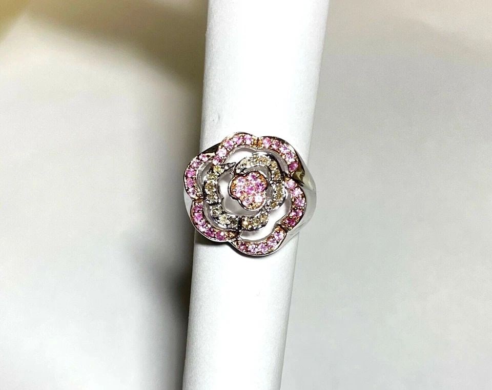 14K WHITE GOLD FLOWER RING, PINK SAPPHIRE, 0.23CTS DIAMONDS ( SIZE: 7.5 ) 8.3G: WOMEN'S 14K WHITE GOLD FLOWER RING WITH PINK SAPPHIRE AND 0.23CTS DIAMONDS Women's 14k White Gold Flower Ring with Pink Sapphire and 0.23CTS Diamonds You are bidding on a new with tags Women's 14k Whi