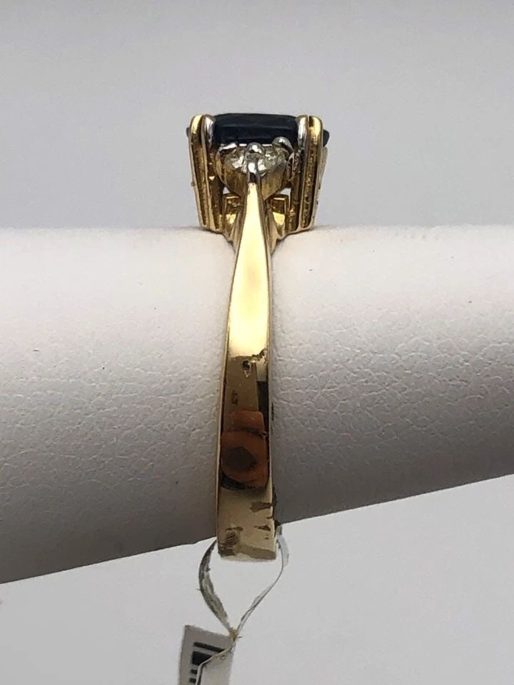 14K GOLD RING, 1.56CTS OF SAPPHIRES, 0.15CTS OF DIAMONDS ( SIZE: 6.5 ) 4G: 14K GOLD RING WITH CENTER NATURAL SAPPHIRE AND 0.15CTS OF DIAMONDS SIZE: 6.5 14k Gold Ring set with center Sapphire and 0.15cts of Diamonds Condition: New with original tag, has been moved around in i