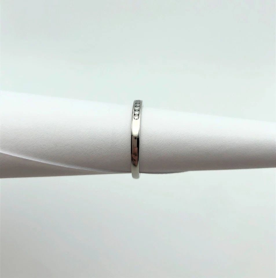 TIFFANY & CO. PLATINUM BAND WITH 0.17CT DIAMONDS (SIZE:6.5): TIFFANY & CO. PLATINUM BAND WITH 0.17CT DIAMONDS (SIZE:6.5) Tiffany & Co. Platinum Band with 0.17ct Diamonds You are bidding on a Tiffany & Co. Platinum Band with 0.17ct Diamonds. The ring has been fu