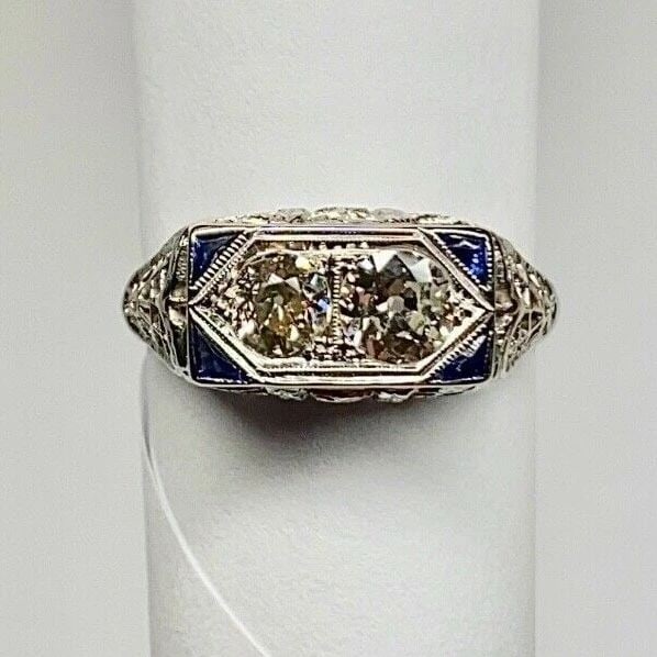 18K WHITE GOLD FILIGREE RING WITH 0.80CTS OF DIAMONDS AND SAPPHIRE: WOMEN'S 18K WHITE GOLD FILIGREE RING WITH 0.80CT DIAMONDS AND BLUE SAPPHIRE Women's 18k White Gold Antique Filigree Ring with 0.80CT Diamonds and Blue Sapphire (Size 7.75) You are bidding on a pre-own