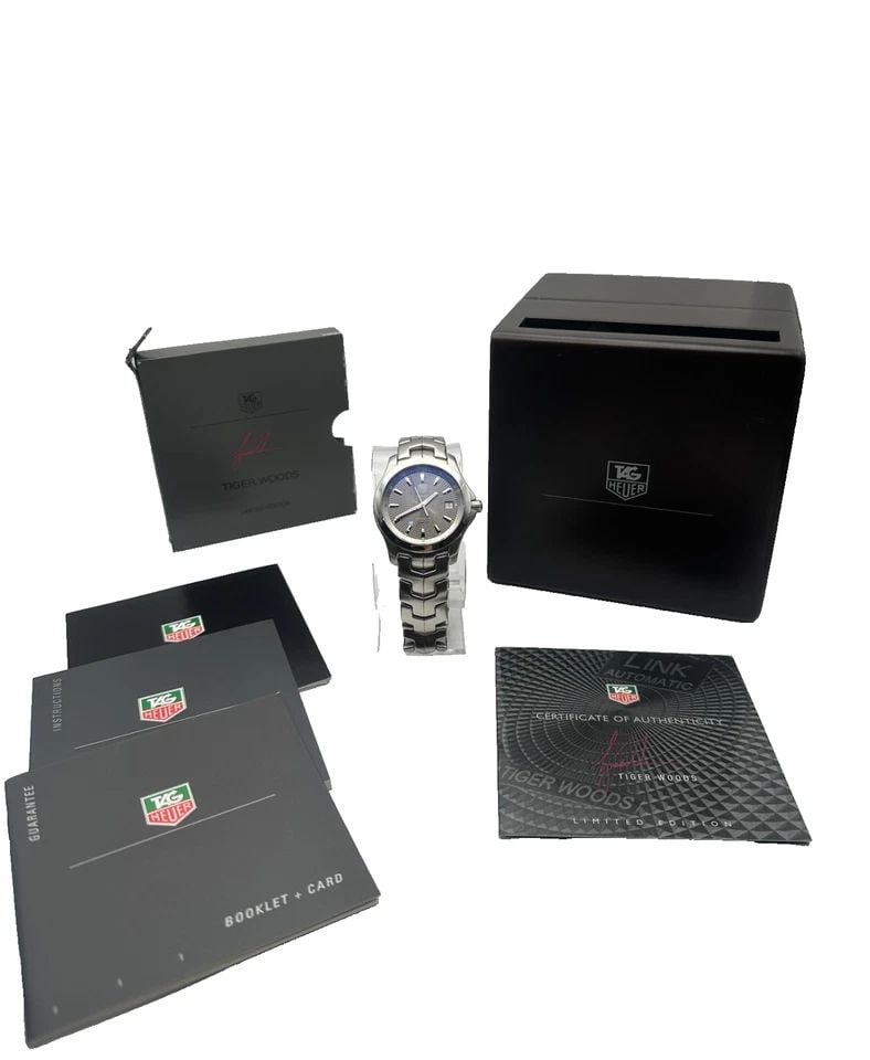 TAG HEUER LINK WJF2113 TIGER WOODS AUTOMATIC WATCH 38MM LIMITED EDITION: TAG Heuer Link WJF2113 Tiger Woods Automatic Watch 38mm Limited Edition Condition: Used, has some marks and scratches on case and band from regular use, original box is damaged. PLEASE LOOK AT PHOTOS 