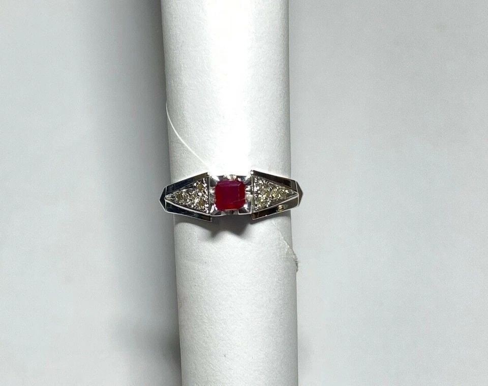 18K WHITE GOLD RING, 0.42CT RUBY, 0.15CTS OF DIAMONDS ( SIZE: 7.25 ) 5.5G: WOMEN'S 18K WHITE GOLD RING WITH 0.42CTS RUBY AND 0.15CTS DIAMONDS (SIZE 7.25) Women's 18k White Gold Ring with 0.42CTS Ruby and 0.15CTS Diamonds (Size 7.25) You are bidding on a ne with tags Women's 