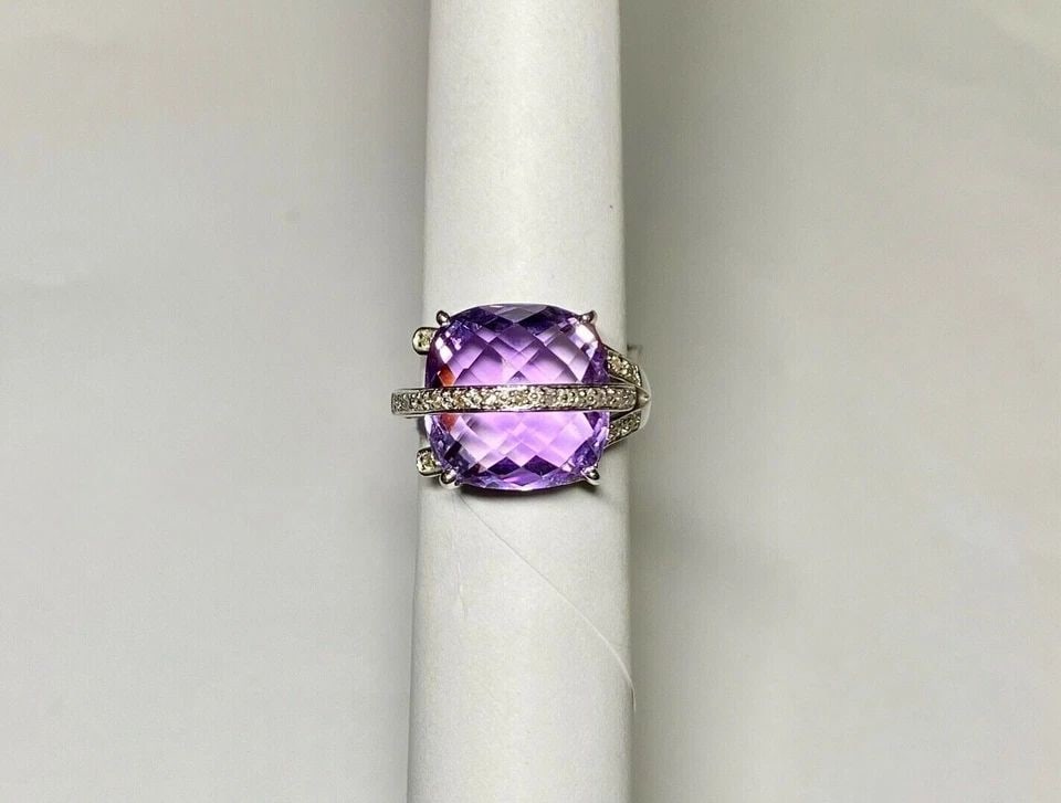 14K WHITE GOLD RING WITH AMETHYST AND 0.12CTS OF DIAMONDS SIZE: 6.5 7G: WOMEN'S 14K WHITE GOLD RING WITH AMETHYST AND 0.12CTS DIAMONDS (SIZE 6.5) Women's 14k White Gold Ring with Amethyst and 0.12CTS Diamonds (Size 6.5) You are bidding on a new with tags Women's 14k White