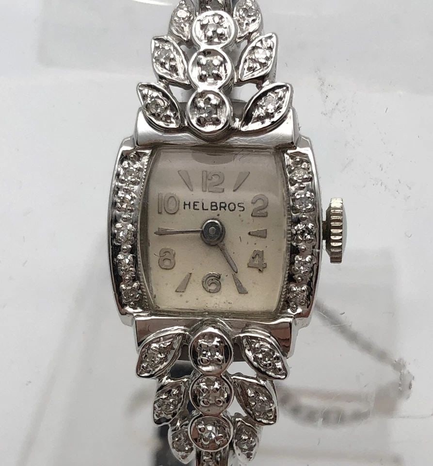VINTAGE LADIES 14K WHITE GOLD, HELBROS WATCH WITH 0.25CTS OF DIAMONDS: Vintage Ladies 14k White Gold, Helbros Watch with 0.25cts of Diamonds Condition: Vintage Used Material: Case and back are solid 14k White Gold (NOT plated/filled). Contains 6.0 grams of 14kt white gol