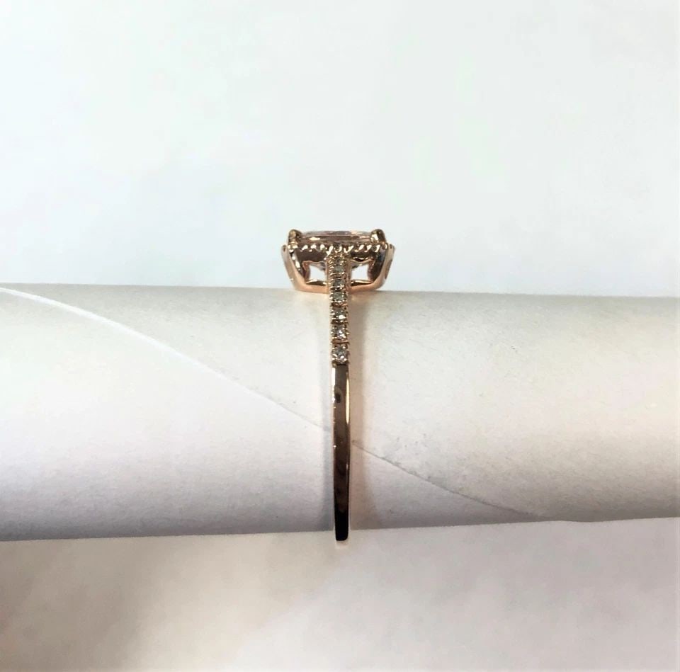 QCD 14K ROSE GOLD RING WITH MORGANITE AND DIAMONDS ( SIZE: 7 ) 2.1G: QCD 14K ROSE GOLD RING WITH MORGANITE AND DIAMONDS (SIZE: 7) QCD 14k Rose Gold Ring with center Morganite and Diamonds You are bidding on a QCD 14k Rose Gold Ring with center Morganite and Diamonds. T