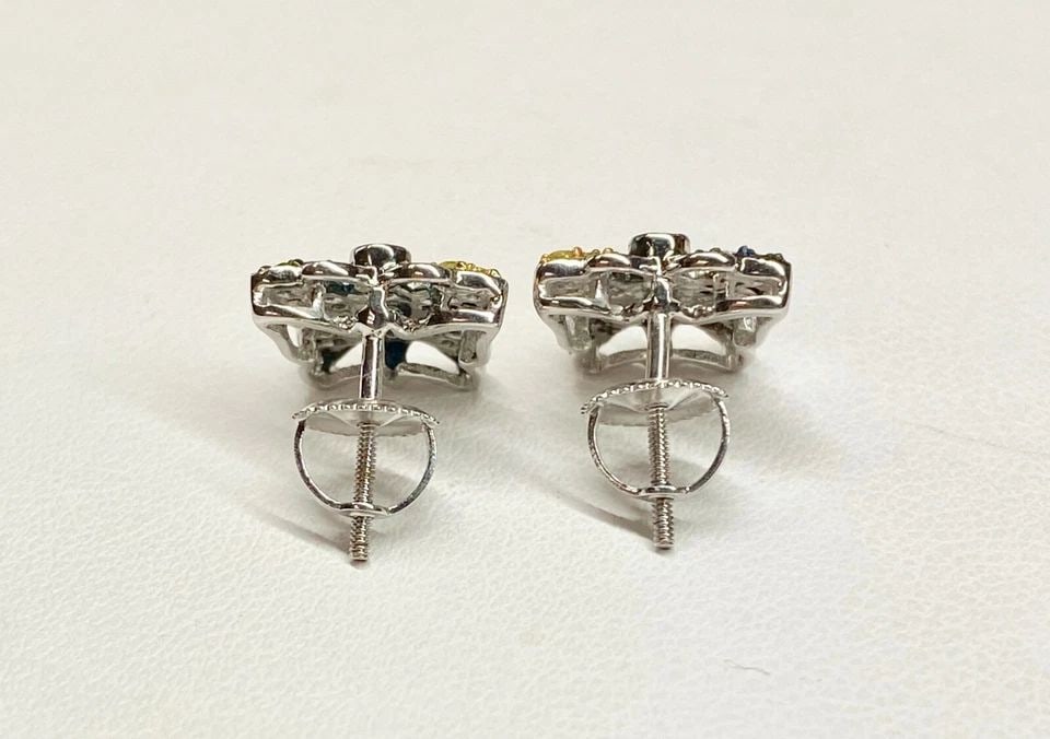 10K WHITE GOLD BUTTERFLY 1.00CTW YELLOW & BLUE DIAMOND EARRINGS 3.2G: 10K WHITE GOLD BUTTERFLY DIAMOND EARRINGS 10k White Gold Butterfly, Diamond Earrings You are bidding on a pre-owned 10k White Gold Butterfly, Diamond Earrings. The earrings has minor scuffs and scratc