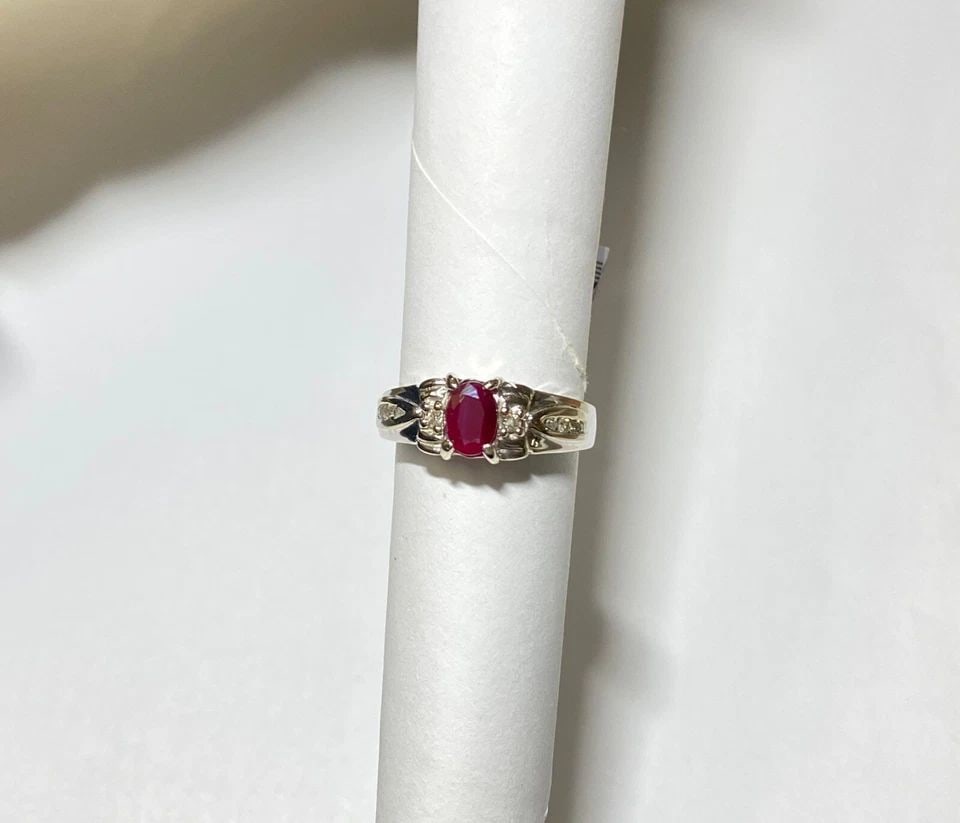 NEW 10K WHITE GOLD RING WITH 0.80CT RUBY AND 0.16CTW DIAMONDS (SIZE 6.25) 3.2G: Women's 10k White Gold Ring with 0.80CTS Ruby and 0.16CTS Diamonds (Size 6.25) You are bidding on a new with tags Women's 10k White Gold Ring with 0.80CTS Ruby and 0.16CTS Diamonds. The ring has minor