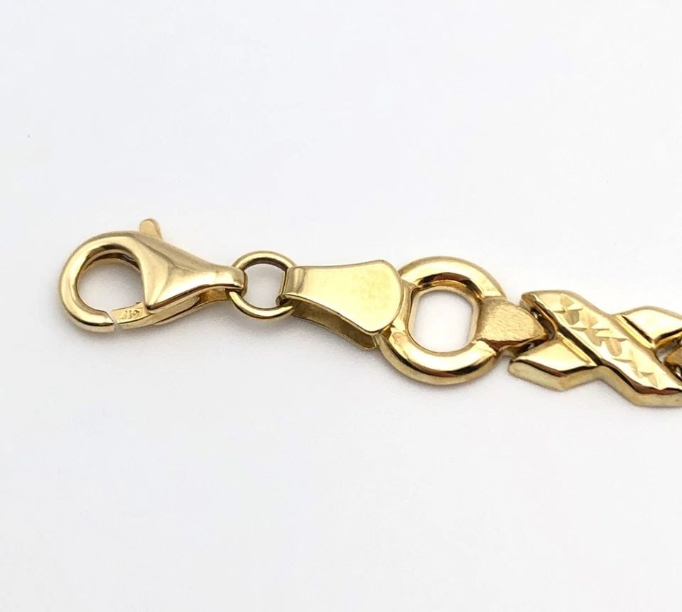 10K YELLOW GOLD ROUND AND X LINKED STYLE BRACELET ( 7.5 INCH ) 5.1 GRAMS: 10K YELLOW GOLD ROUND AND X LINKED STYLE BRACELET 7.5" 5.1 GRAMS 10k Yellow Gold Round and X Linked style Bracelet Condition: Display Bracelet, Light Wear Material: 10k Yellow Gold Weight: 5.1 grams B