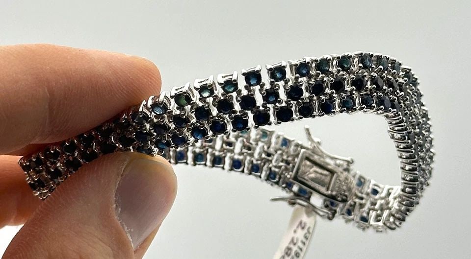 925 STERLING SILVER BRACELET, 2.28CTS OF NATURAL SAPPHIRES (8 INCH) 27.3 GRAMS: 925 STERLING SILVER BRACELET WITH 2.28CTS OF NATURAL SAPPHIRES 8" 27.3 GRAMS 925 Sterling Silver Bracelet with 2.28cts of Natural Sapphire 8" 27.3 grams Condition: New with Tag, has some marks and scr