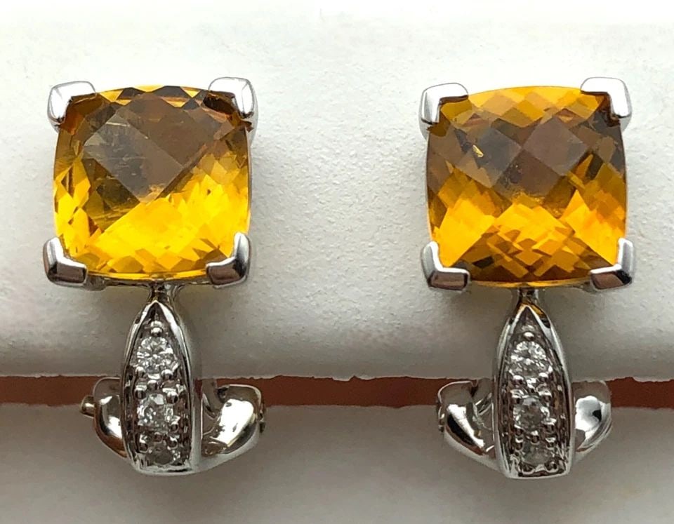 14K WHITE GOLD EARRINGS WITH CITRINE AND 0.06CTW DIAMONDS 3.4G OMEGA BACKS: 14K WHITE GOLD EARRINGS WITH CITRINE AND 0.06CTS OF DIAMONDS 3.4G OMEGA BACKS 14k White Gold Earrings with Citrine and 0.06cts of Diamonds Condition: Used, have been cleaned Material: 14k White Gold W