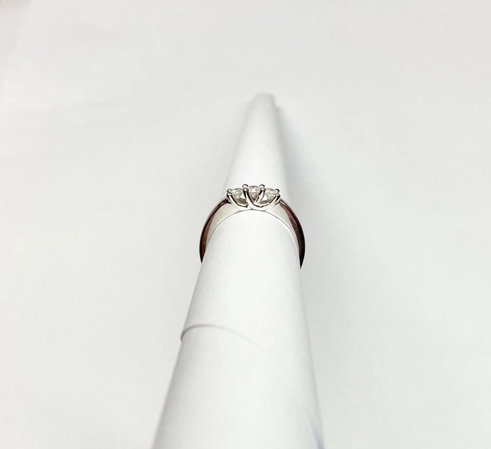 NEW 14K WHITE GOLD THREE STONE RING WITH 0.40CTW DIAMONDS (SIZE 7.25) 3.1 GRAMS: WOMEN'S 14K WHITE GOLD THREE STONE RING WITH 0.40CT DIAMONDS (SIZE 7.25) Women's 14k White Gold Three Stone Ring with 0.40ct Diamonds (Size 7.25) You are bidding on a new with tags Women's 14k White G