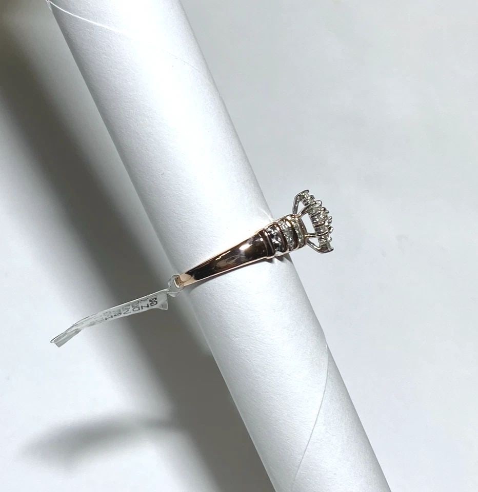 NEW 10K ROSE GOLD CLUSTER RING, 0.25CTW DIAMONDS (SIZE 7.25) 3.4 GRAMS: WOMEN'S 10K ROSE GOLD RING WITH 0.25CT DIAMONDS (SIZE 7.25) Women's 10K Rose Gold Ring with 0.25CT Diamonds (Size 7.25) You are bidding on a new with tags Women's 10K Rose Gold Ring with 0.25CT Diamon