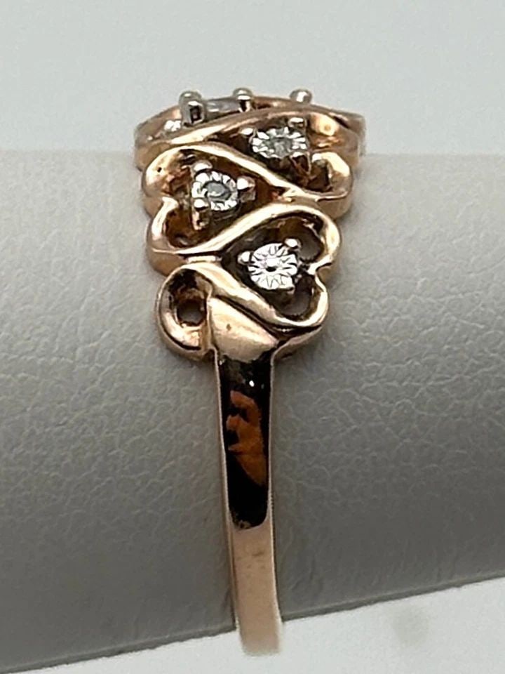 10K ROSE GOLD RING WITH HEARTS AND 0.09CTS OF DIAMONDS ( SIZE: 6.5 ) 2.6G (1 of 2)