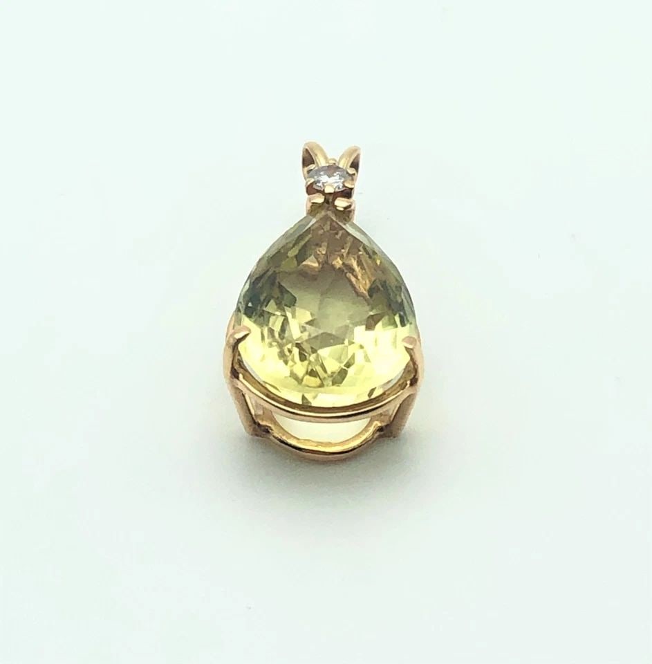 14K GOLD PENDANT WITH PRASIOLITE GREEN QUARTZ AND 0.15CT DIAMOND 4 GRAMS: 14K GOLD PRASIOLITE GREEN QUARTZ AND DIAMOND PENDANT 14k Gold Prasiolite Green Quartz and Diamond pendant You are bidding on a 14k Gold Pendant with Prasiolite Green Quartz and Diamond. The piece has 