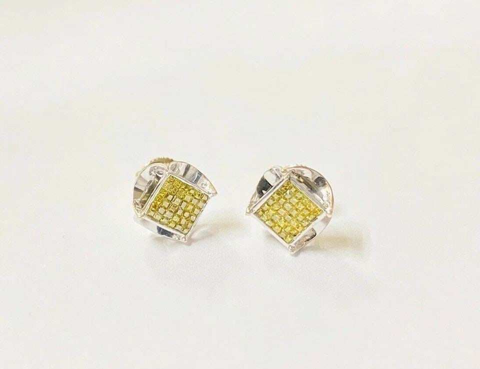 14K WHITE GOLD EARRINGS WITH 0.35CTS OF YELLOW DIAMONDS 2.4G: 14K WHITE GOLD EARRINGS WITH 0.35CTS YELLOW DIAMONDS 14k White Gold Earrings with 0.35CTS Yellow Diamonds You are bidding on a pre-owned 14k White Gold Earrings with 0.35CTS Yellow Diamonds. The earri