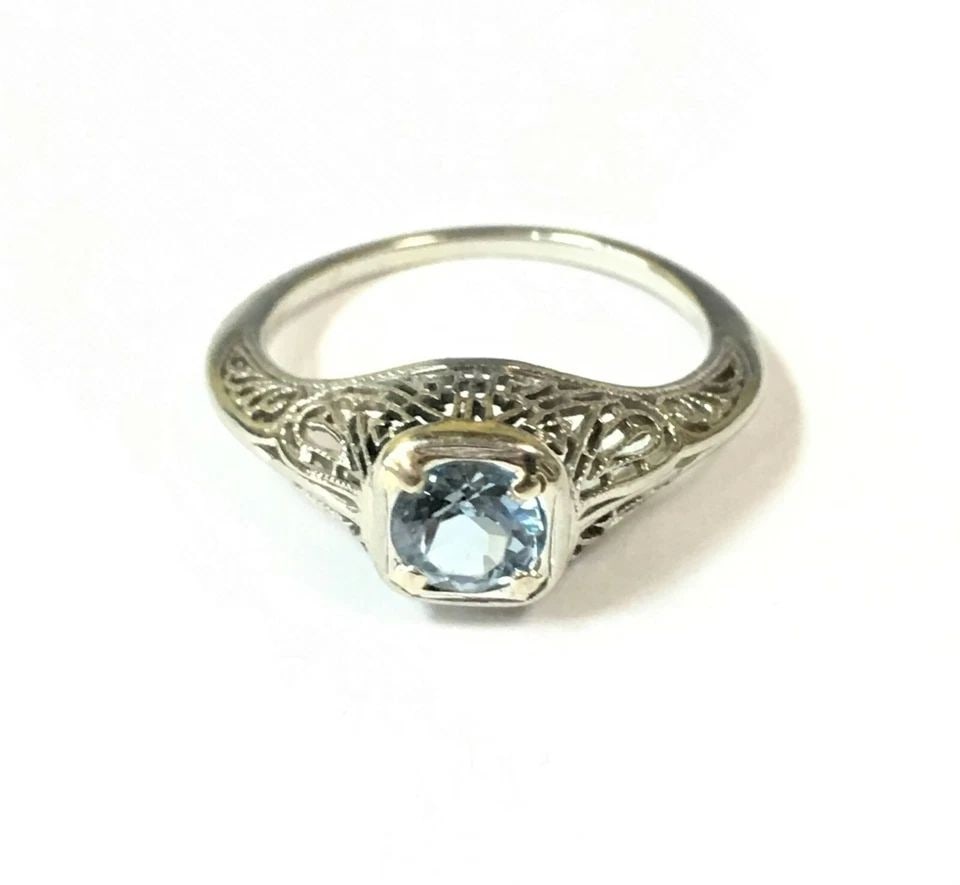 14K WHITE GOLD FILIGREE RING WITH AQUAMARINE (SIZE 5.5) 2.1 GRAMS: 14K WHITE GOLD FILIGREE RING WITH AQUAMARINE (SIZE: 5.5) 14k White Gold Filigree Ring with Aquamarine You are bidding on a pre-owned 14k White Gold Filigree Ring with Aquamarine. The ring has marks an