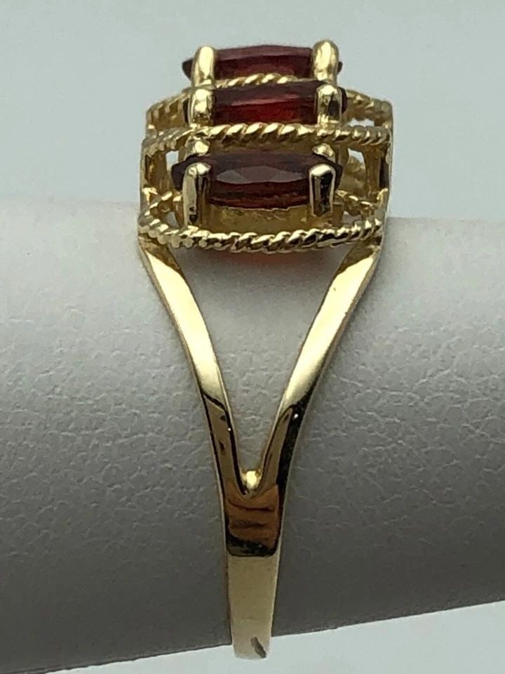 10K GOLD RING WITH FIVE MARQUISE CUT GARNETS (SIZE 5.5) 3.4 GRAM (1 of 2)