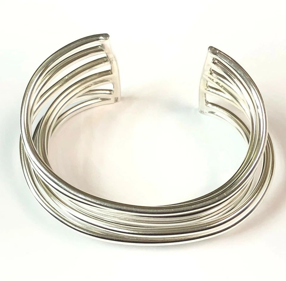 ZINA 925 STERLING SILVER MULTI LOOP CUFF BRACELET HEAVY (76.4 GRAMS): WOMAN'S ZINA 925 STERLING SILVER MULTI LOOP CUFF BRACELET (HEAVY 76.4 GRAMS) Woman's Zina 925 Sterling Silver multi loop Cuff bracelet You are bidding on a pre-owned Woman's Zina 925 Sterling Silver m