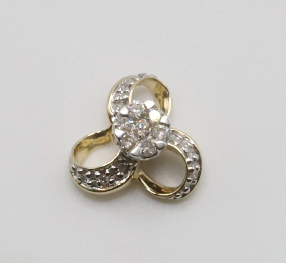 14K GOLD CELTIC KNOT PENDANT WITH 0.25CTS NATURAL DIAMONDS ( 2 GRAMS ) (1 of 2)